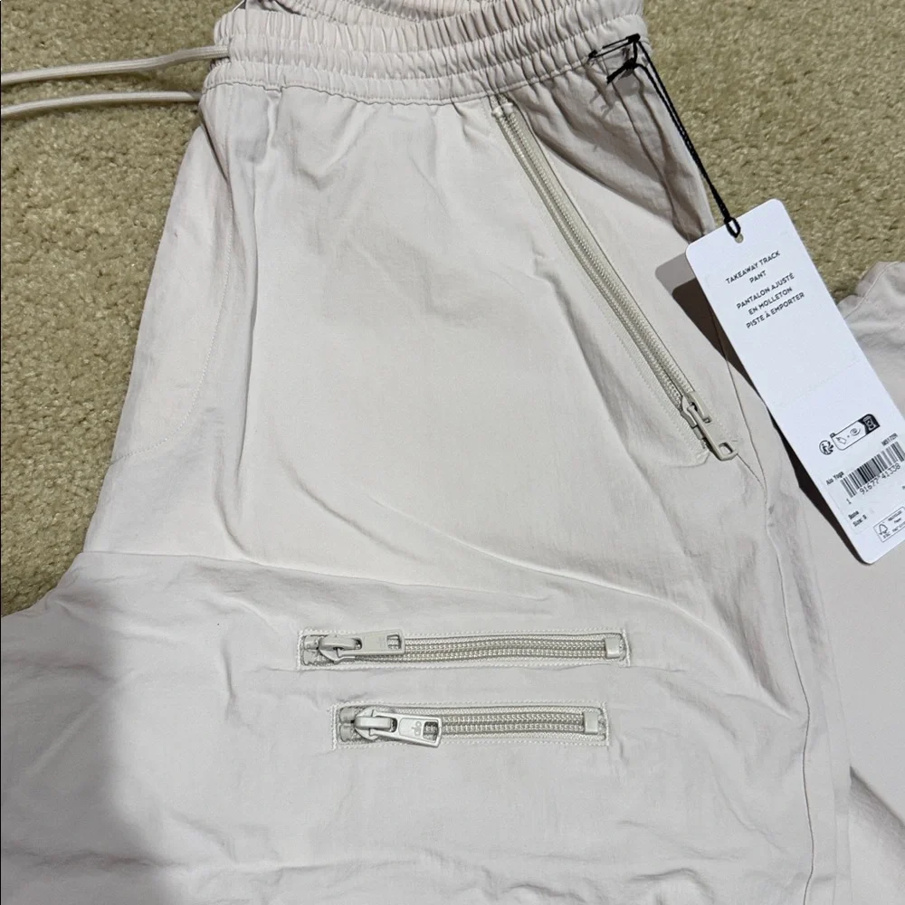 Alo Yoga takeaway track pants bone